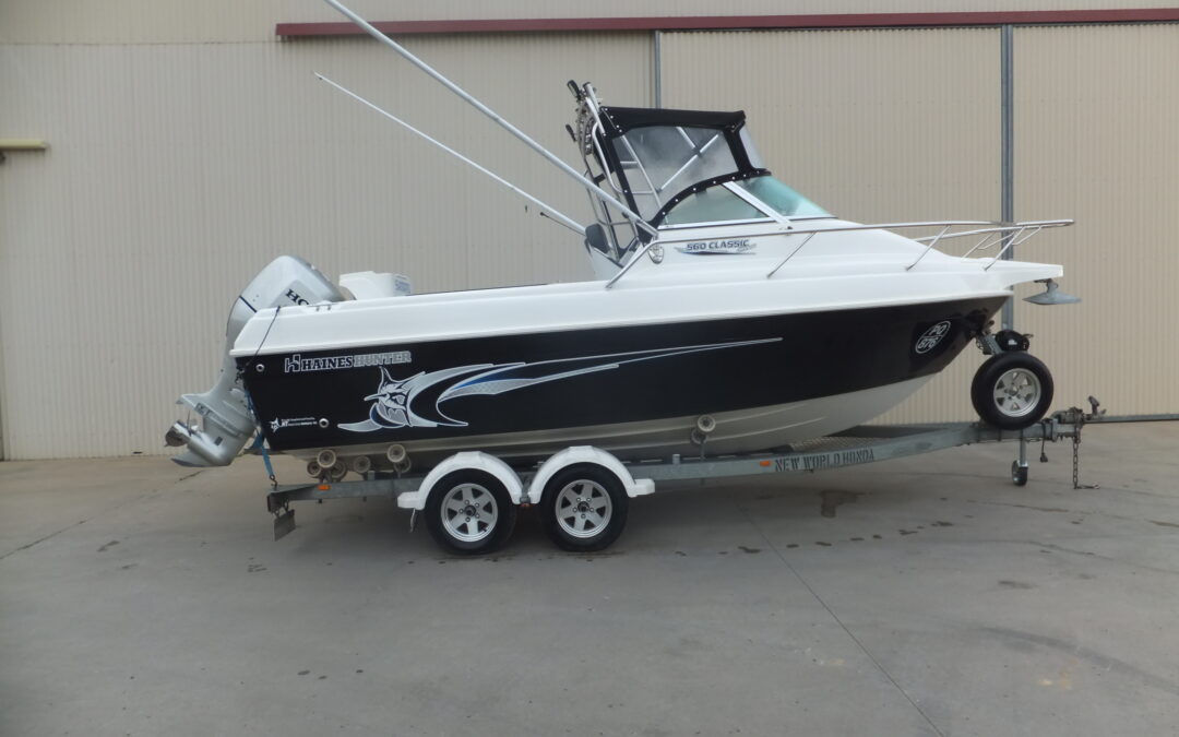 2011 Haines Hunter 560 Offshore Honda 150 001
